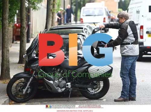 Adrian Chiles Rides Motorbike Without Helmet