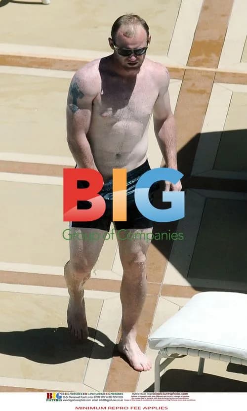 Wayne and Coleen Rooney Poolside