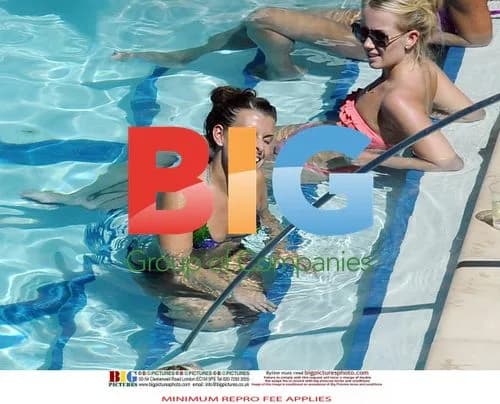 Wayne and Coleen Rooney at pool