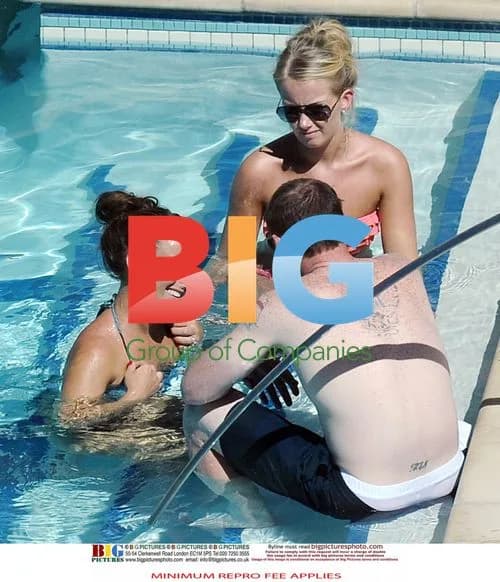 Wayne and Coleen Rooney at the Poolside