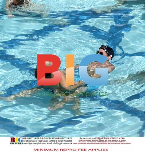 Rooney Family Poolside Vacation