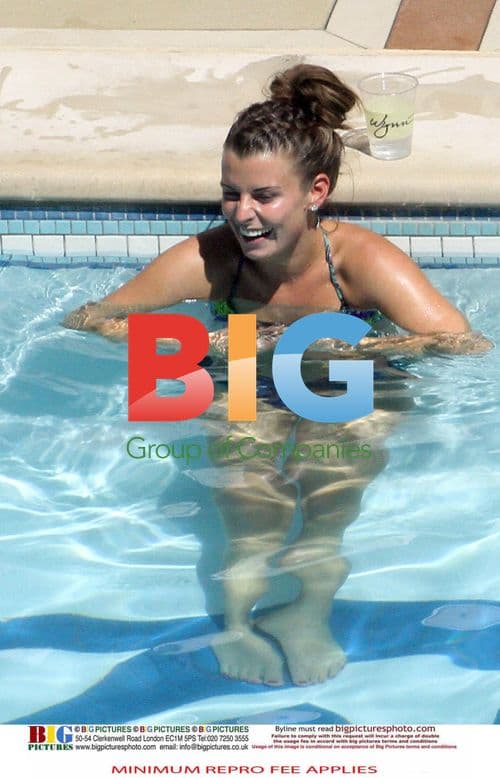 Wayne and Coleen Rooney Poolside with Friends