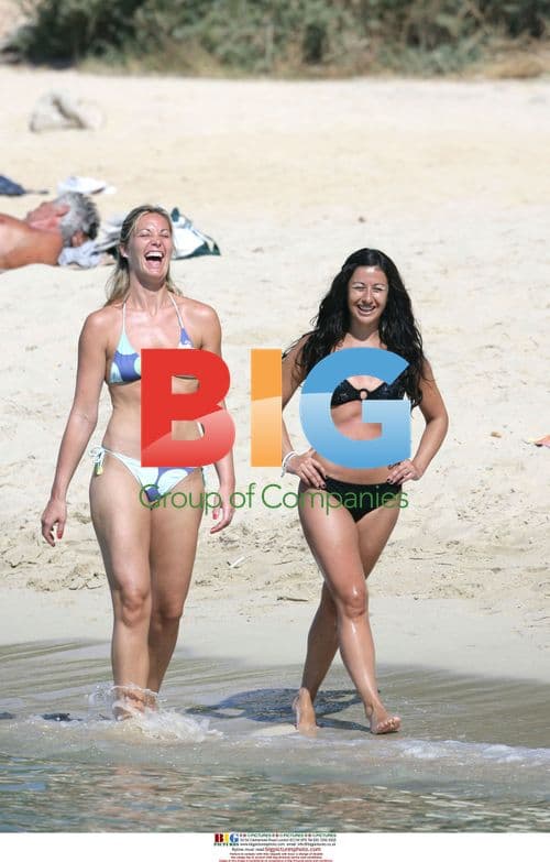 Hayley Tamaddon Relaxes on Beach in Spain