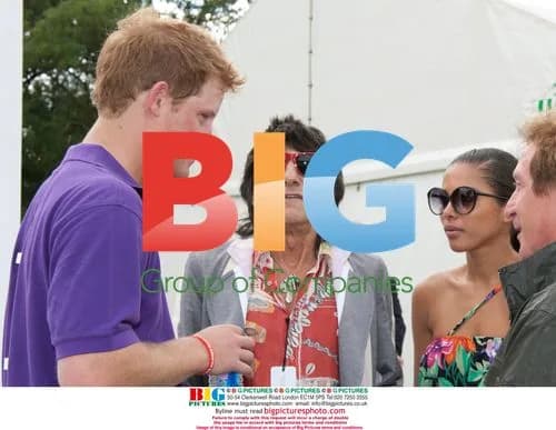 Prince Harry chatting at Asprey World Cup
