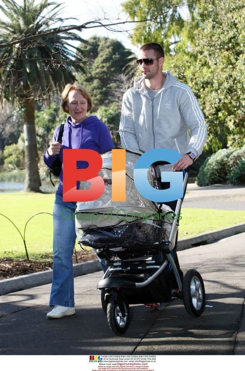 Kris Smith and family take baby Ethan for a walk