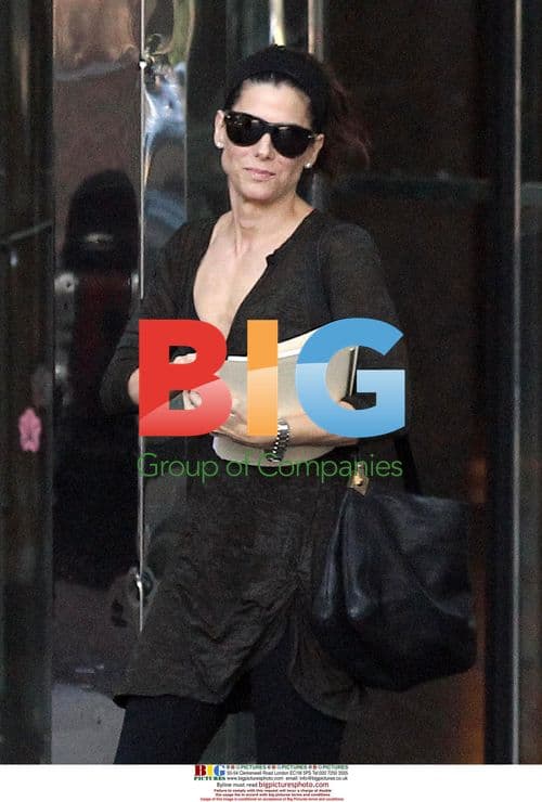 Sandra Bullock Leaves Omni Hotel in Austin