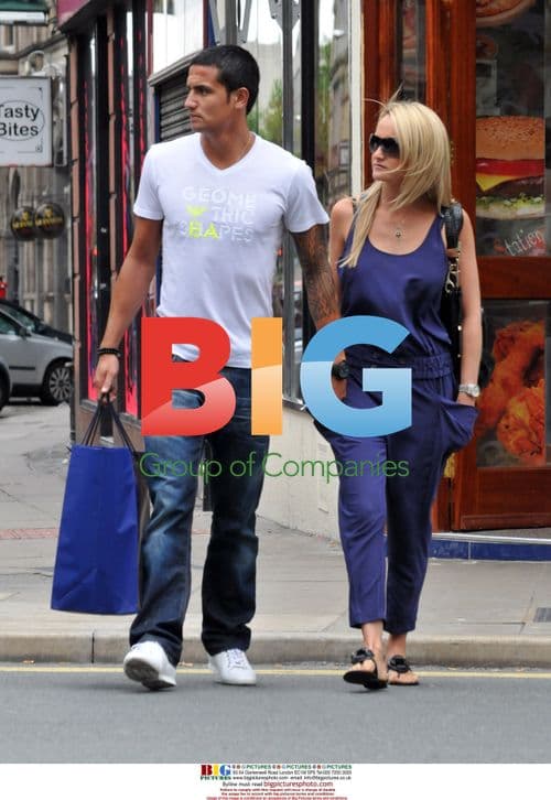 Tim Cahill Shopping with Wife