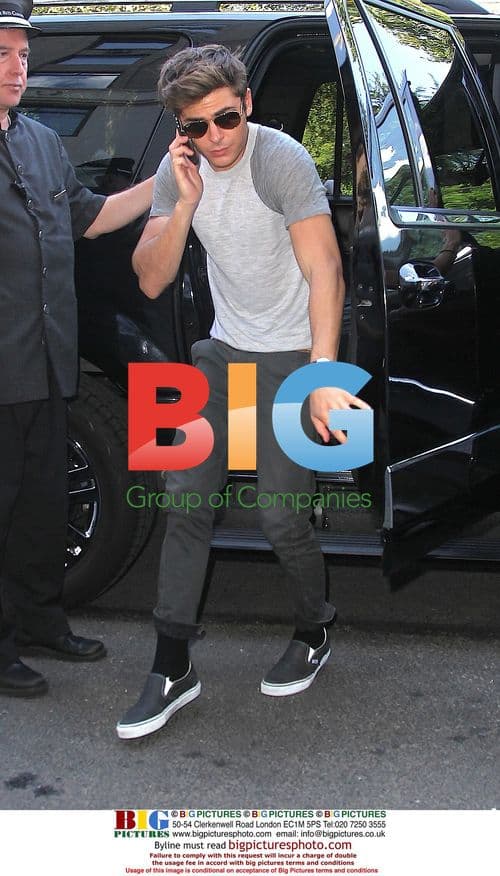Zac Efron Arriving at Hotel in NYC