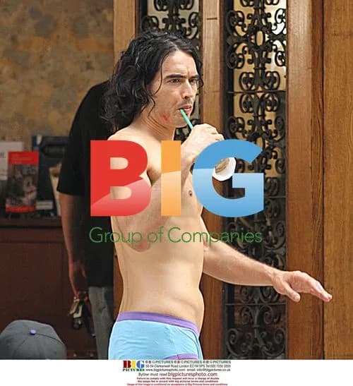 Russell Brand Strips Down on 'Arthur' Set
