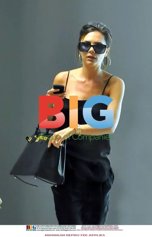 Victoria Beckham with Cold Sore at Airport