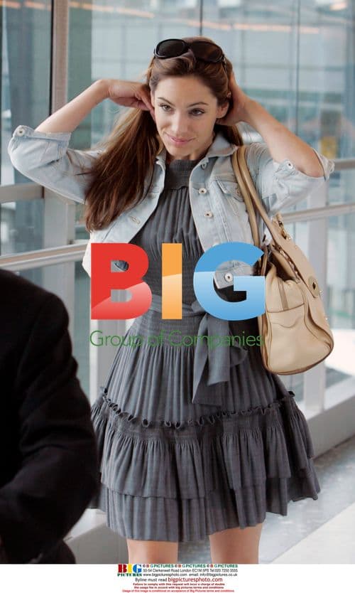 Kelly Brook Spotted at Airport