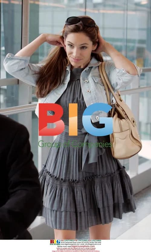 Kelly Brook Spotted at Airport