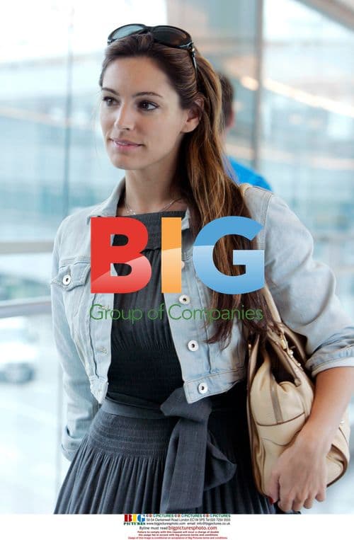 Kelly Brook Spotted at Airport
