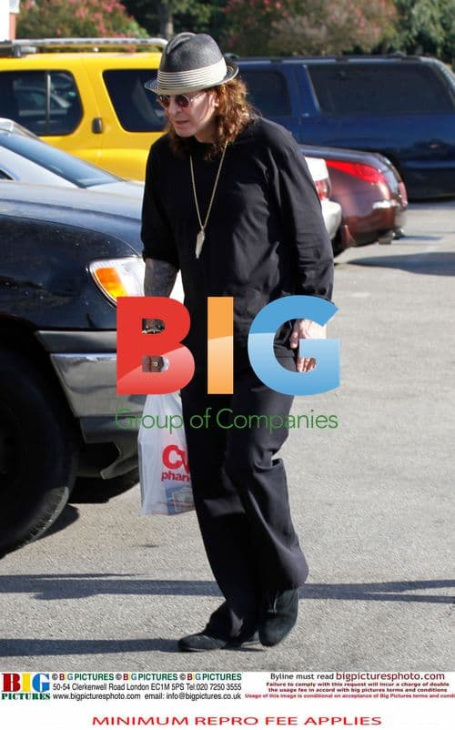 Ozzy Osbourne Leaves Drug Store with Enema