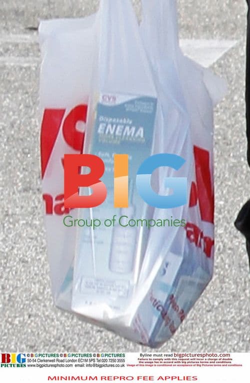 Ozzy Osbourne Leaves Drug Store with Enema