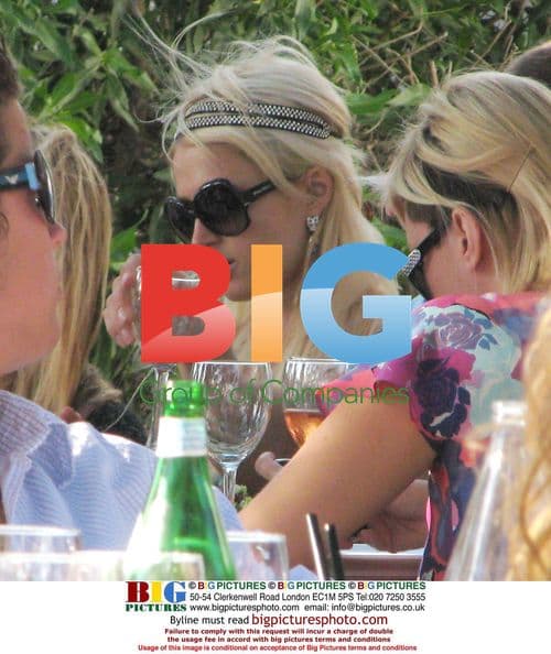 Paris Hilton Relaxes with Friends in Ibiza