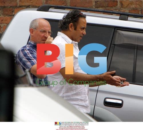 Corrie actor Jimmi Harkishin giving directions