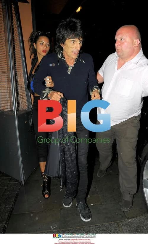 Ronnie Wood and Ana Araujo Leave Zuma Restaurant