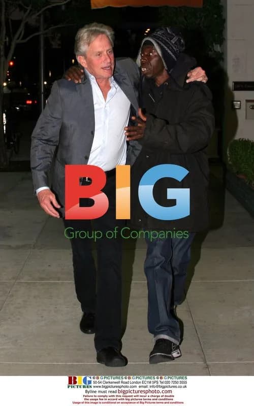 Michael Douglas talks to homeless man