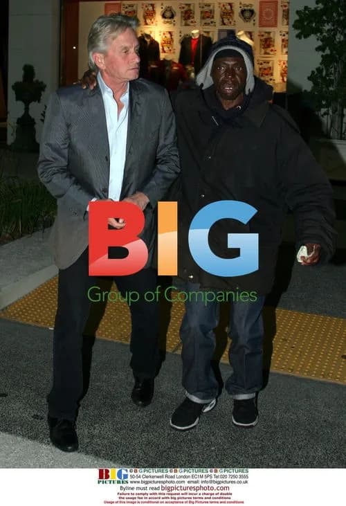Michael Douglas Gives Money to Homeless Man