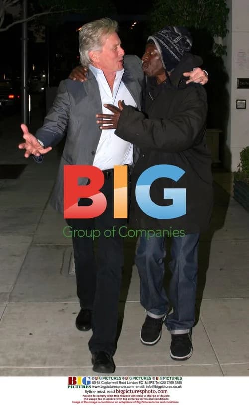 Michael Douglas Helps Homeless Man