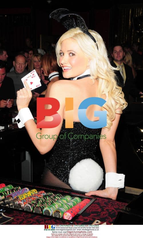 Holly Madison deals blackjack at Playboy Club