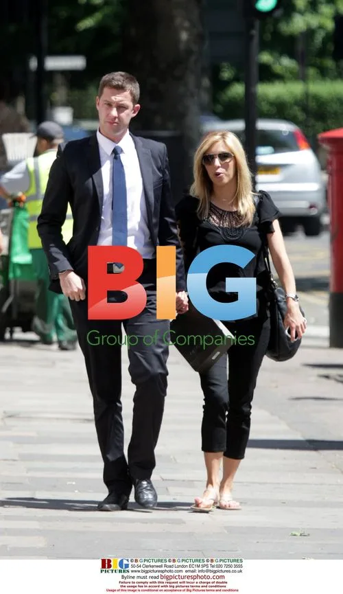 Kate Walsh and Phil Taylor kiss in London