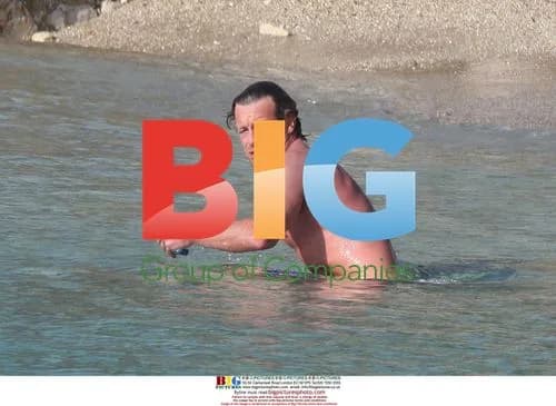 Simon Baker Swims with Family in France
