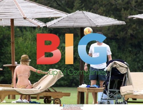 Claudine and Robbie Keane with son in Sardinia