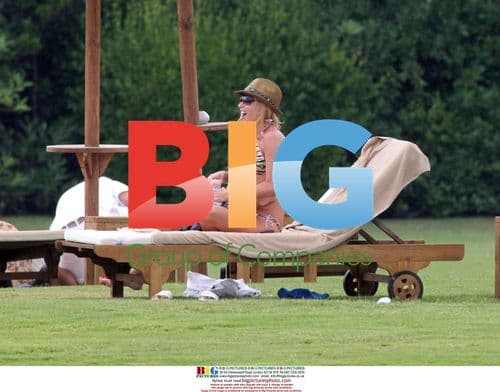 Claudine and Robbie Keane with son in Sardinia