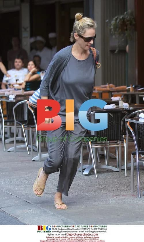 Uma Thurman Spotted Leaving Restaurant with Friend