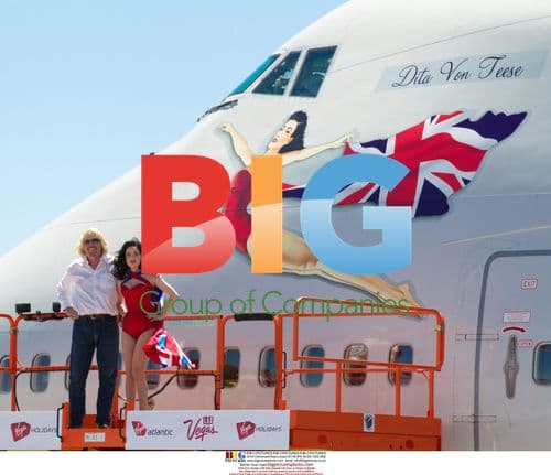 Sir Richard Branson and Dita Von Teese at McCarran Airport