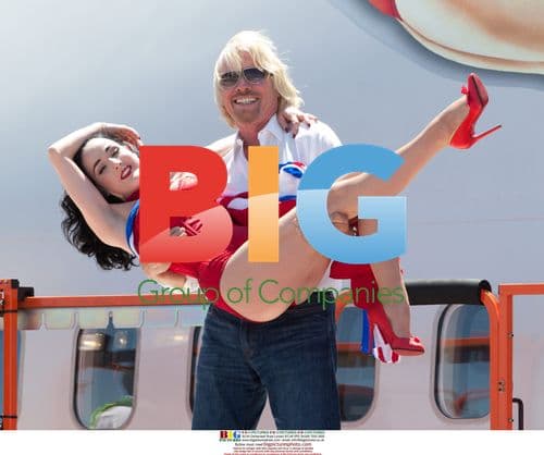 Sir Richard Branson and Dita Von Teese at McCarran Airport