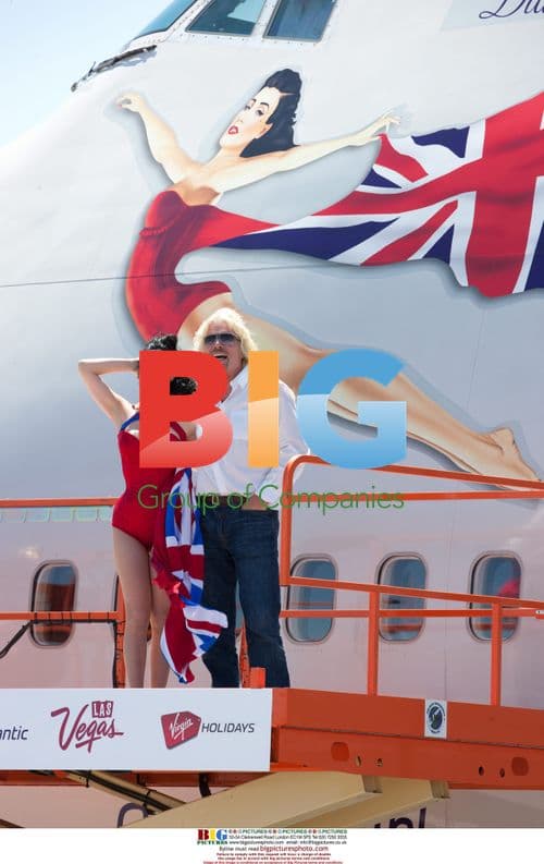 Sir Richard Branson and Dita Von Teese at McCarran Airport