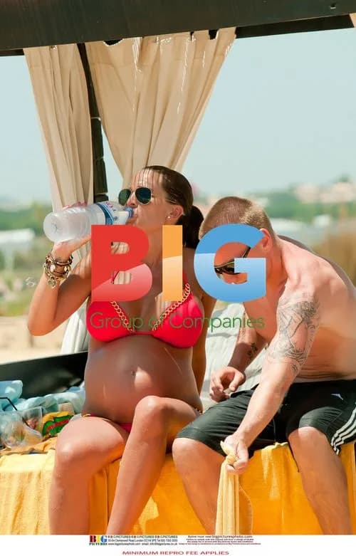 Pregnant Danielle Lloyd and Jamie O'Hara in Portugal