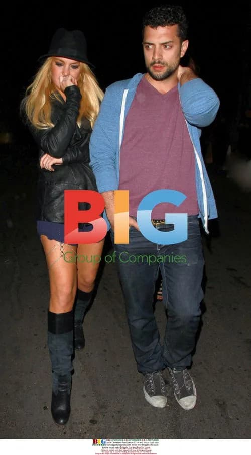Lindsay Lohan Enters Nightclub in LA