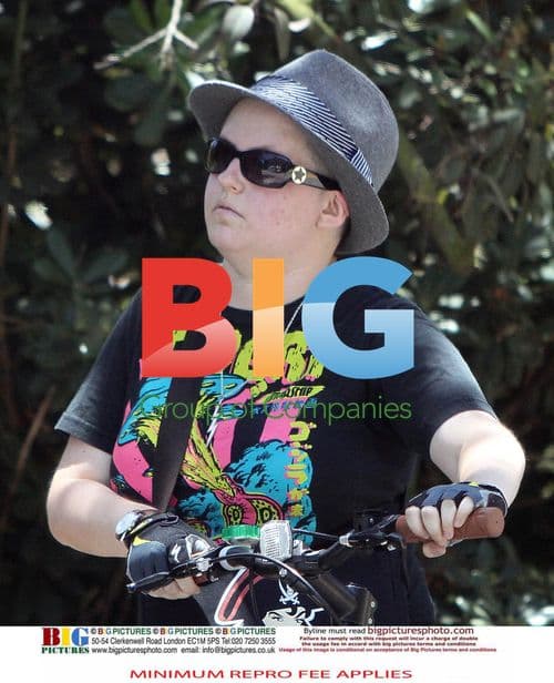 Kathlyn Beatty Entering Parents' Home