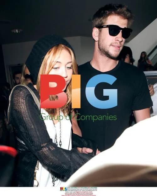 Miley Cyrus & Liam Hemsworth at LAX