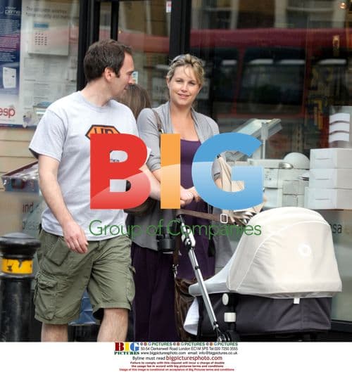 Kim Medcalf out with baby in London