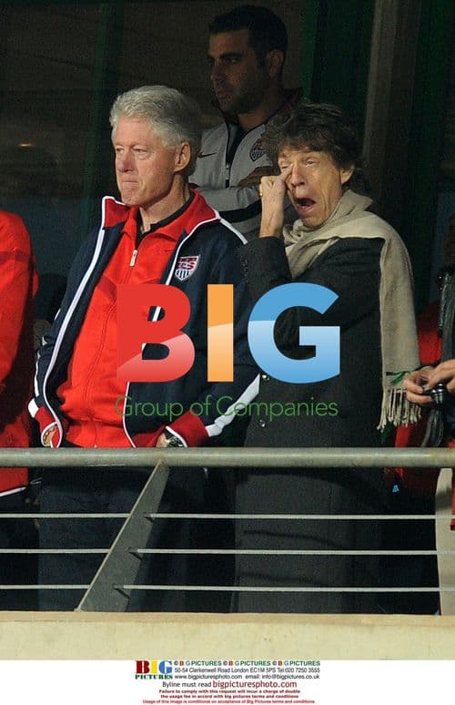 Bill Clinton and Mick Jagger watch World Cup