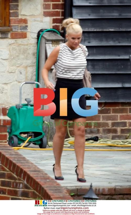 Kerry Katona Waves to Kids