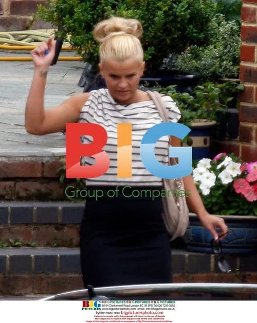 Kerry Katona Waves to Kids
