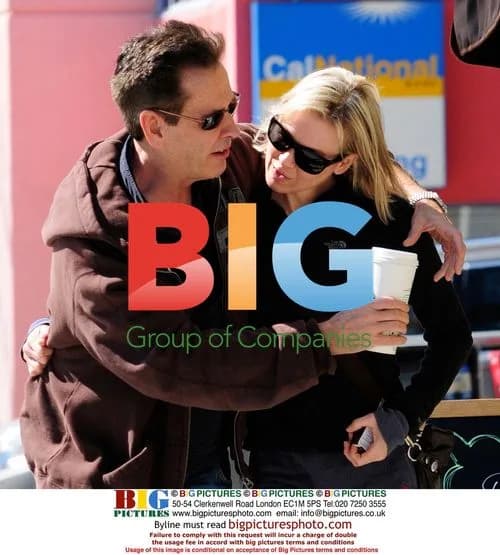 Renee Zellweger leaves Starbucks with friend