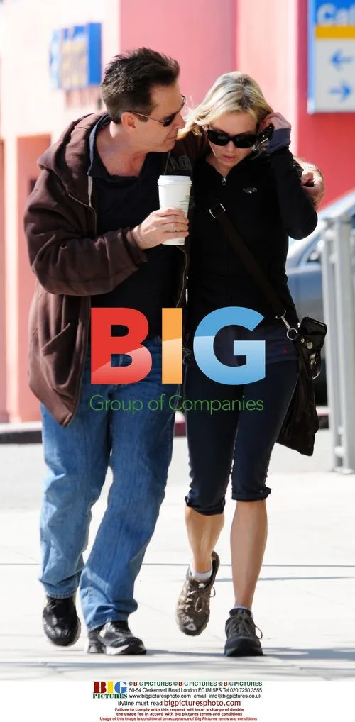 Renee Zellweger leaves Starbucks with friend