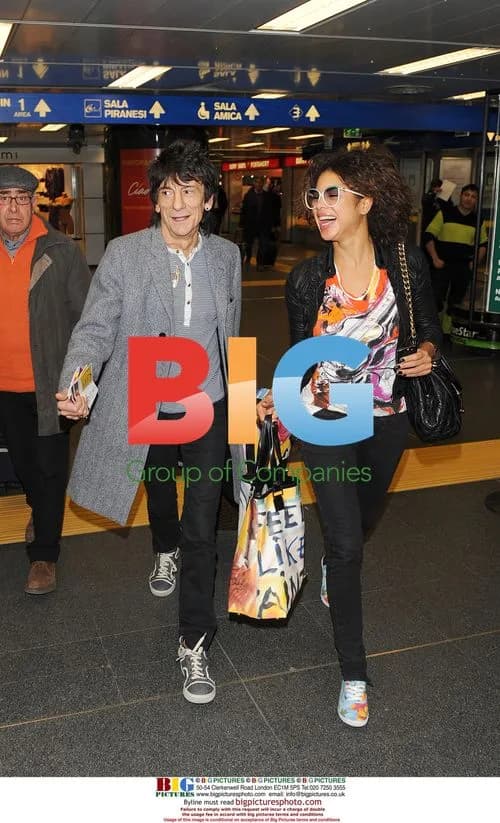Ronnie Wood and Ana Araujo at Milan Airport