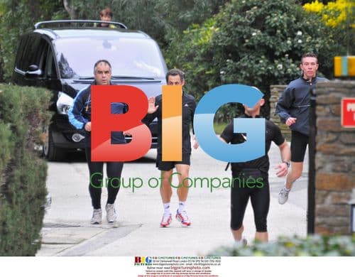 Sarkozy Jogging with Bodyguards