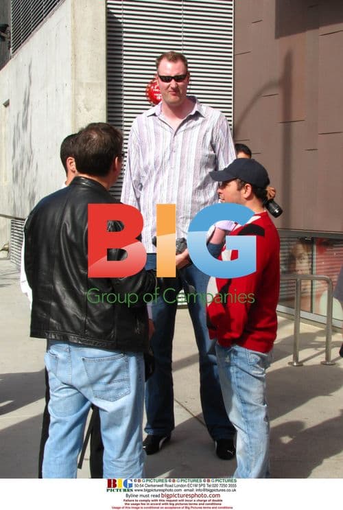 UK's tallest man Neil Fingleton shooting business video