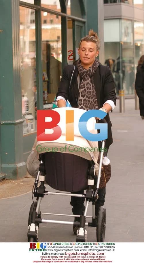 Coleen Rooney Out Shopping with Baby