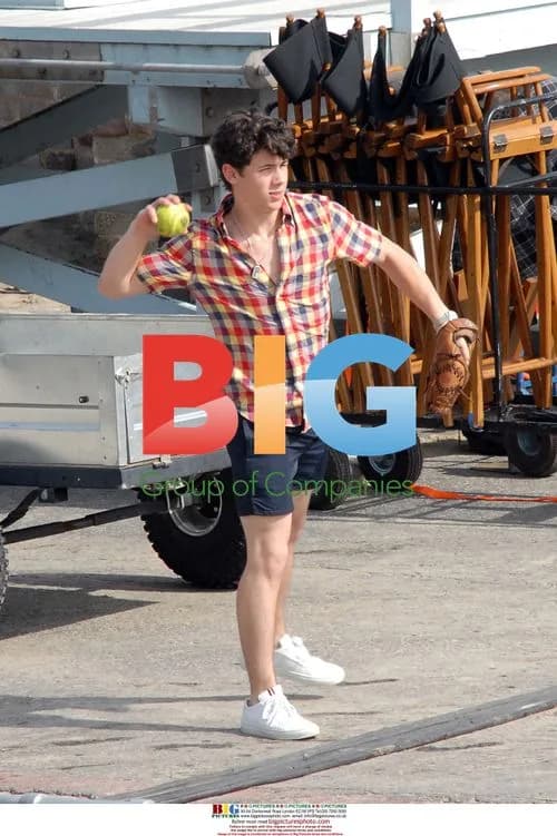 Nick Jonas Plays Catch on Set with Brothers