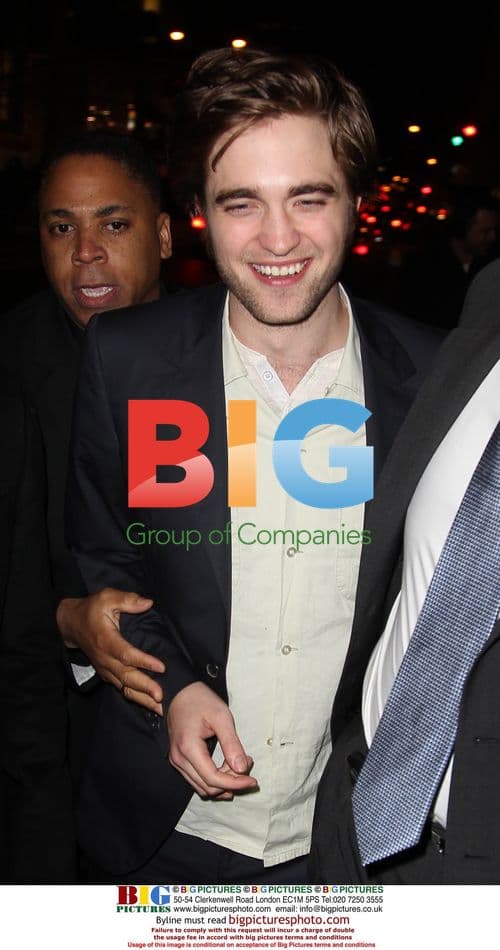 Robert Pattinson Signs Autographs at 'Remember Me' Premiere